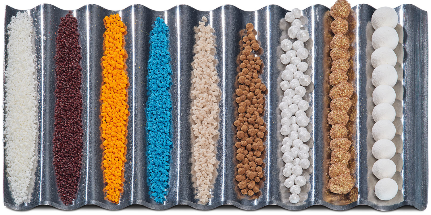 Spray Granulation. Dustfree granules from liquids containing solids